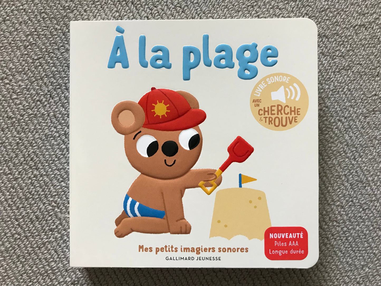 A la plage (livre sonore)