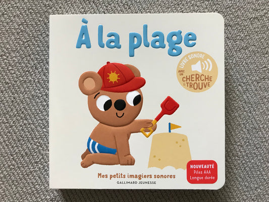 A la plage (livre sonore)